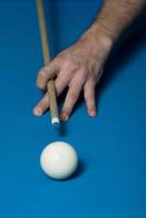 Close-Up Of A White Ball Waiting To Shoot photo