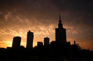 Sunset of city center in Warsaw, Poland photo