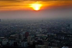 View across Bangkok skyline showing in sunset photo