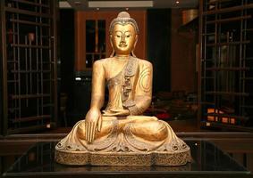 Statue of sitting golden Buddha