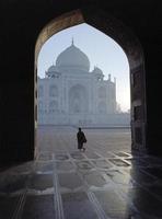 Taj Mahal seen through an arch