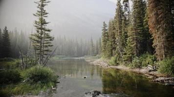 Mountain Stream, Smoky Air and a Fisherman photo
