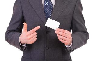 Business man showing blank card. photo