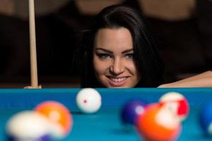 Smiling Happy Woman Playing Billiard