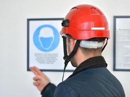 Young Manual Worker Wearing Hardhat photo