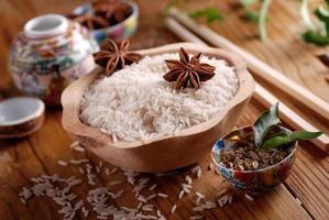 Basmati rice in wooden bowl photo