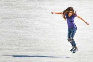 Young girl at the ice rink outdoor