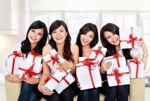 woman group with many gift boxes photo