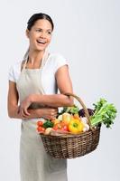Smiling woman with fresh produce