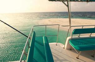 Turquoise yacht in Maldives photo