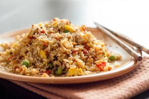 Fried Rice with Vegetables and fried eggs photo