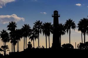 Long Beach California with Shoreline palm trees and the Lighthou photo