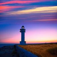 Formentera sunset in Barbaria cape lighthouse photo