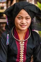 Portrait of young woman from Tai Dam hilltribe in Laos photo