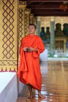 Portrait of a young Buddhist monk photo