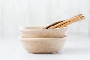 Wooden Bowl and Spoon on the Table