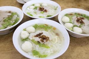 Bowls of Southeast Asian Fishball Noodle Soup photo