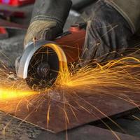 sparks while cutting steel photo