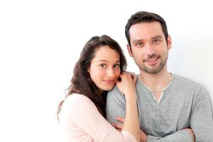 Portrait of  young happy couple on a white background photo