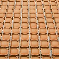 Orange seat in sport stadium photo