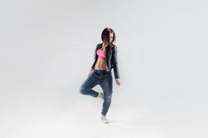 young woman hip hop dancer with white background