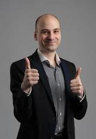 businessman with thumb up photo