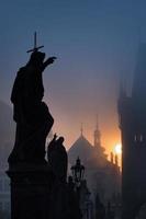 Statues of Charles Bridge at dawn