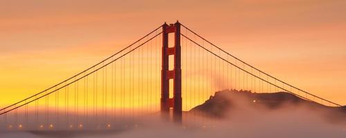 Golden Gate bridge at sunrise photo