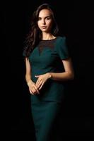 Elegant photo of beautiful woman in green dress
