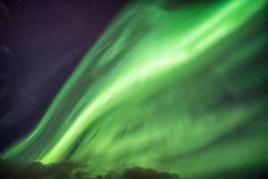 Northern Lights in starry sky photo