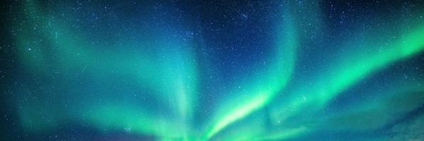 Aurora borealis in the night sky photo