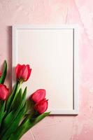 Red tulips with picture frame template  photo