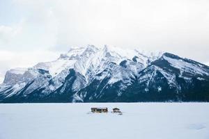 Cabin on lake in Banff, Canada photo