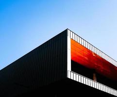 Concrete building under blue sky photo