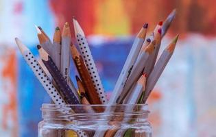 Colored pencils in jar  photo