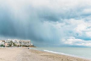 Rainfall at the beach photo