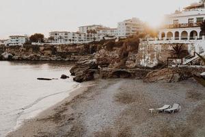 Buildings on beach shoreline photo