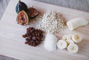 Sliced fruit on brown wooden table photo