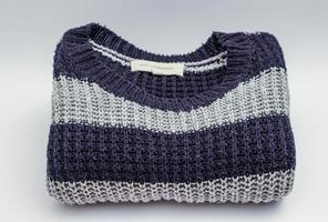 Gray and blue striped sweater photo