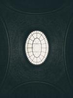 Low angle view of geometric skylight photo