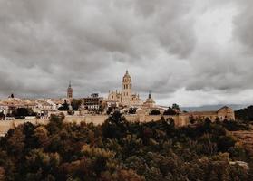 Segovia Cathedral under cloudy sky photo