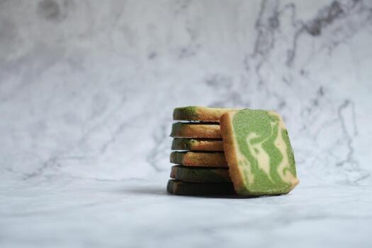 Sliced matcha bread on marble background photo