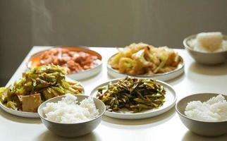 Asian cuisine dishes on table photo