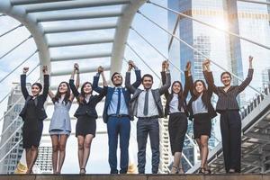 Group of business people at outside in city photo