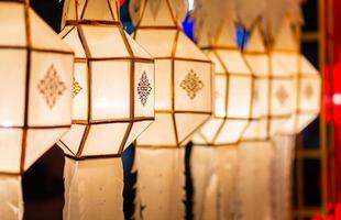 A string of Nanna lanterns fill festival hall in Thailand photo