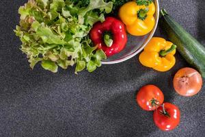 Ingredients for salad on granite countertop  photo