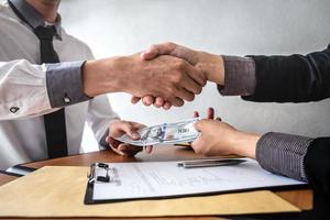 A financial business transaction between two people  photo