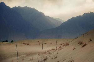 Sunset after sand storm in  desert photo