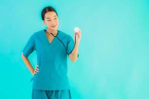 Woman doctor holding stethoscope photo