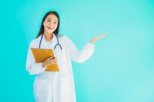 Asian woman doctor with clipboard photo